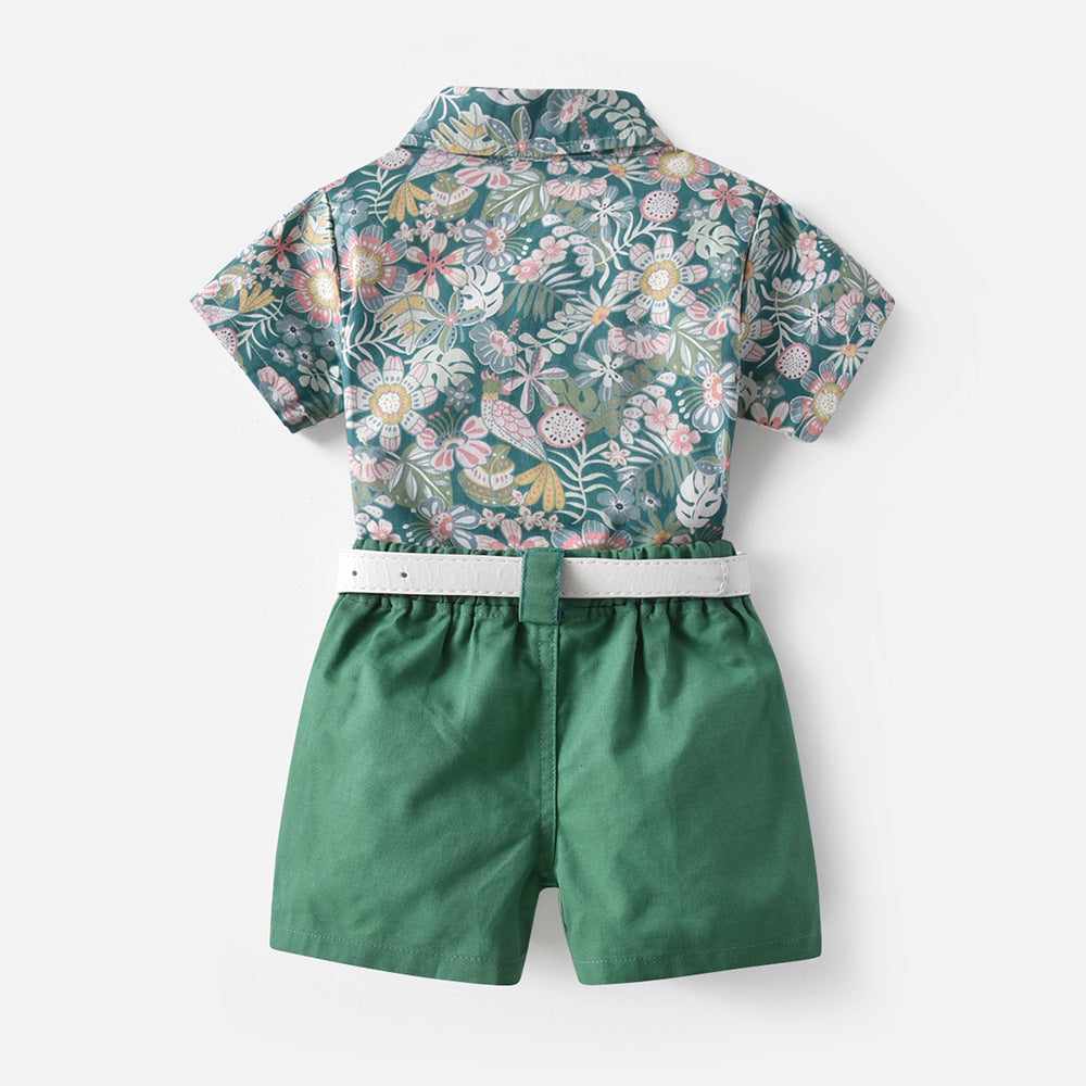 Children's clothing set in fresh green with floral print, featuring cotton fabric for beach-style vacation leisure.