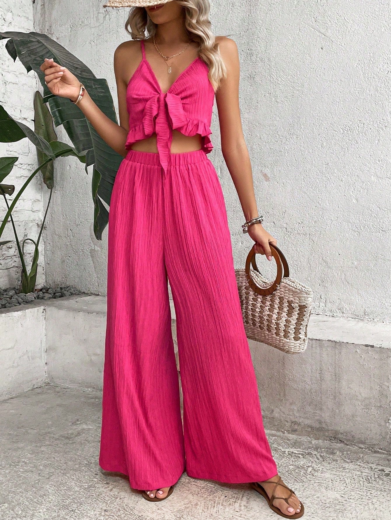 Elegant pink knot front cami top and wide leg pants set for spring/summer.