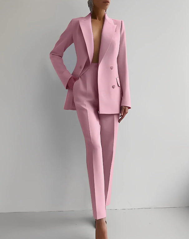 Women's pink casual suit with long sleeve, single-breasted jacket, and slim fit trousers.