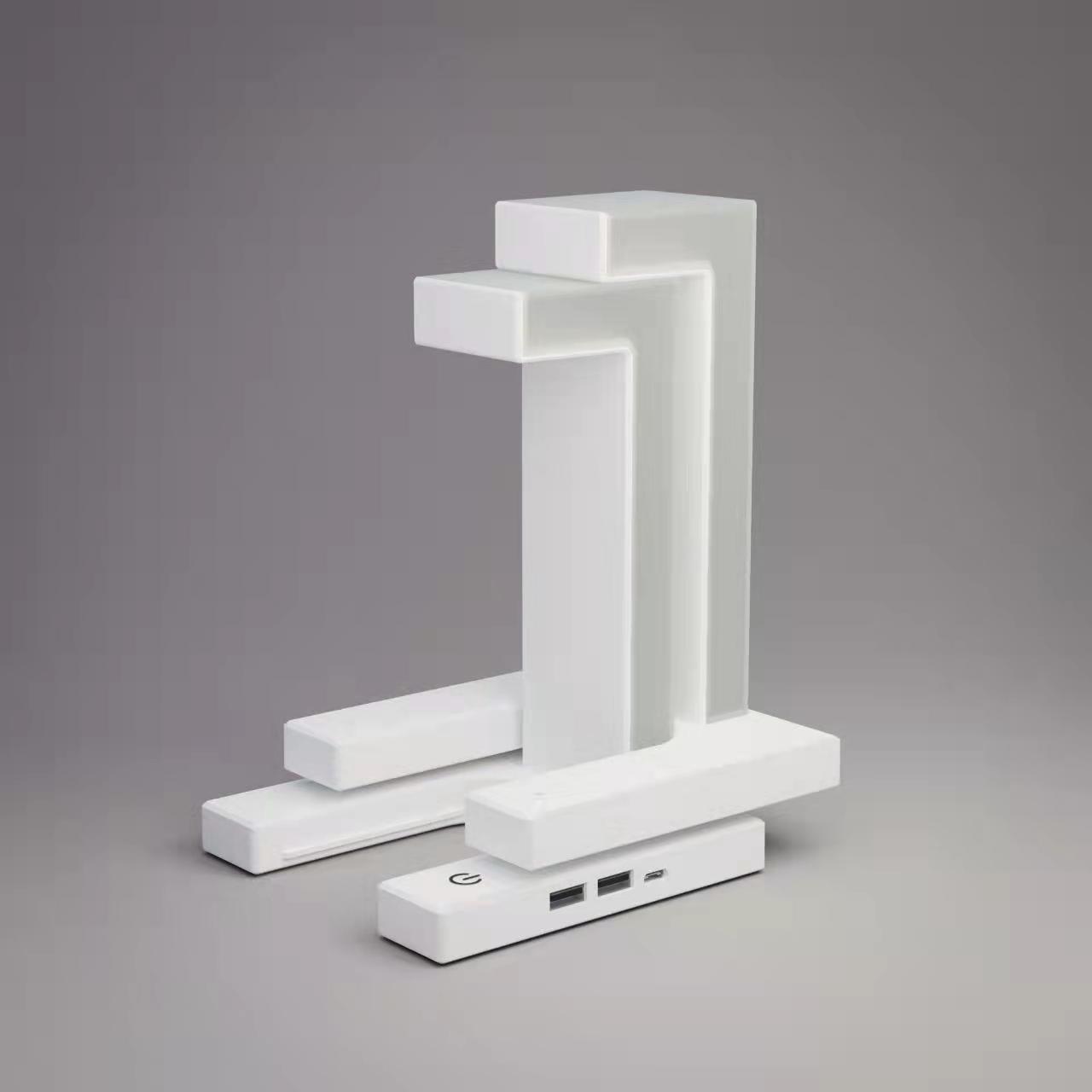 Modern minimalist white wireless charging suspension table lamp with magnetic floating design for home and office.