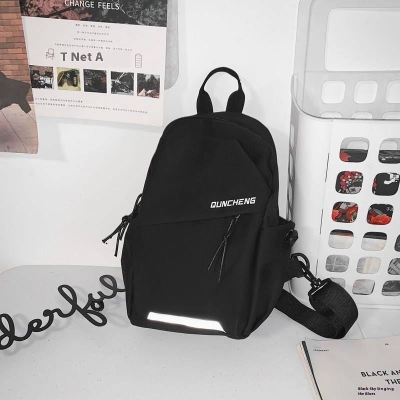 Men's black crossbody chest bag with letter pattern, featuring wear-resistant nylon material, ideal for leisure travel.