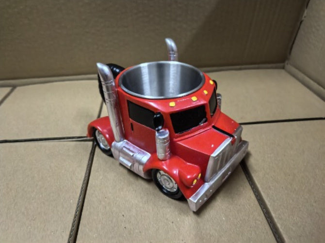 Red semi-truck shaped ceramic coffee mug with modern design.