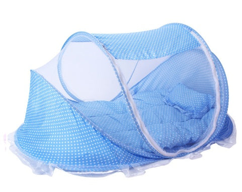 Foldable breathable baby bed net with pillow, blue polka dot design.