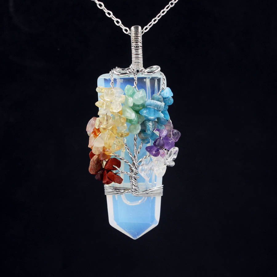 Crystal column Tree of Life winding pendant necklace with natural and synthetic crystals.
