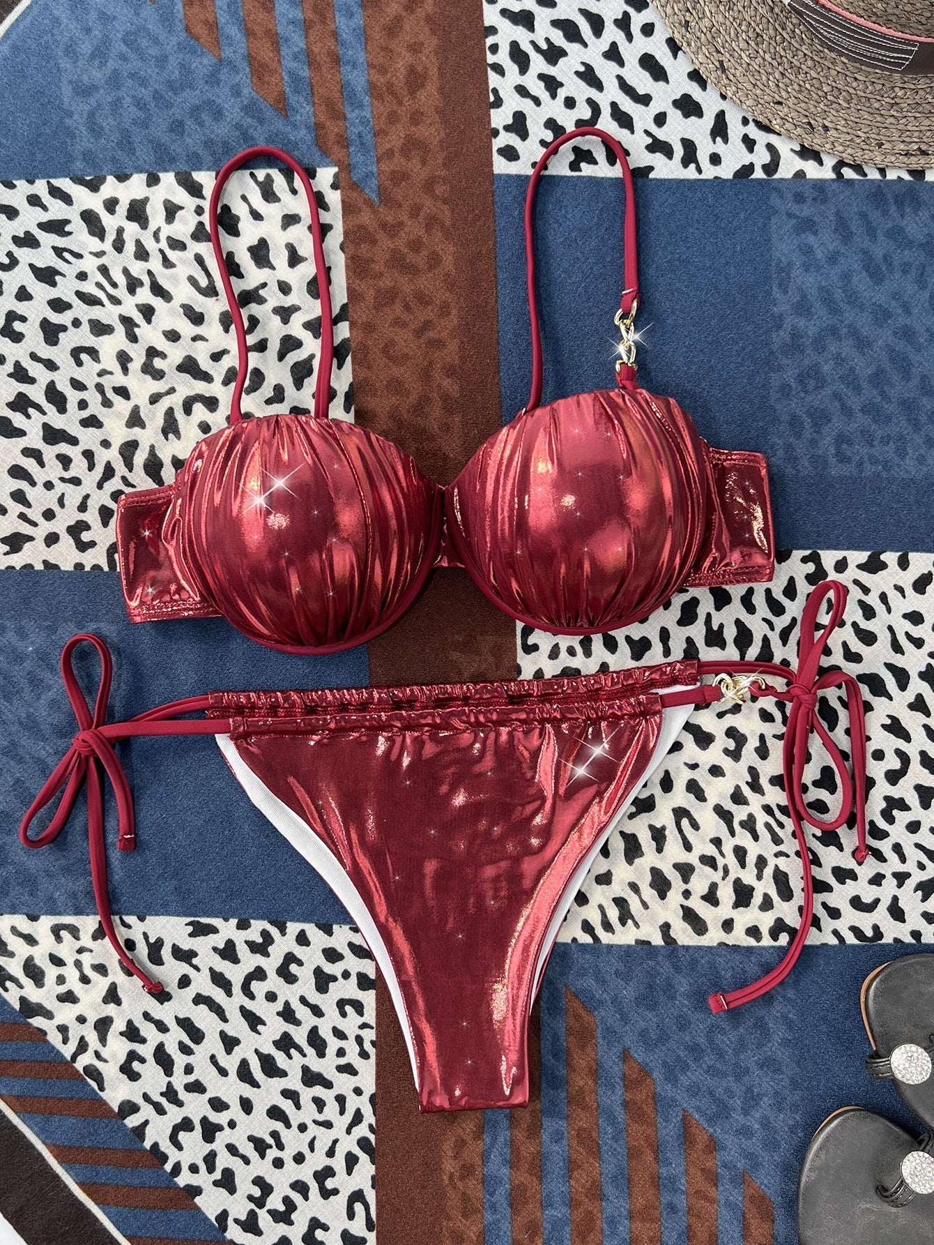 Sexy metallic bikini with push-up design and steel bracket detailing.