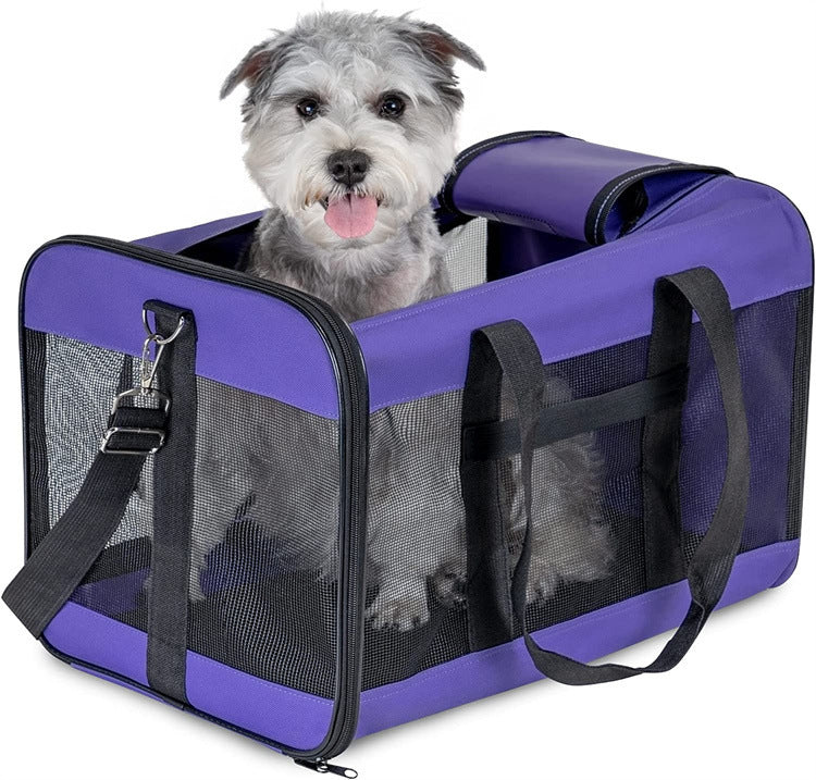 Portable purple pet carrier for dogs and cats, breathable and foldable design.