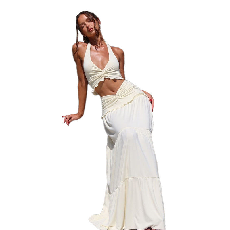 Women's V-neck halter vest high waist skirt set in milky white, sleeveless and mid-length.