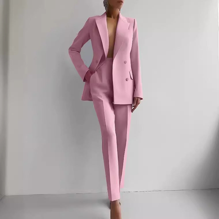 Women's pink casual business suit with long sleeve single-breasted jacket and slim fit trousers.
