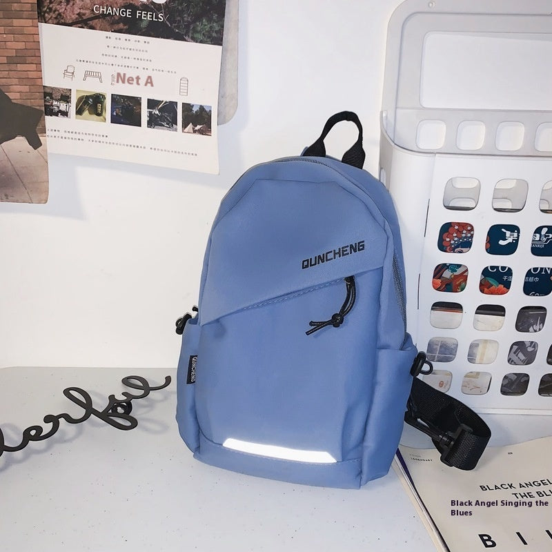 Men's small blue crossbody bag with letter pattern, ideal for leisure travel, made of nylon with polyester lining.