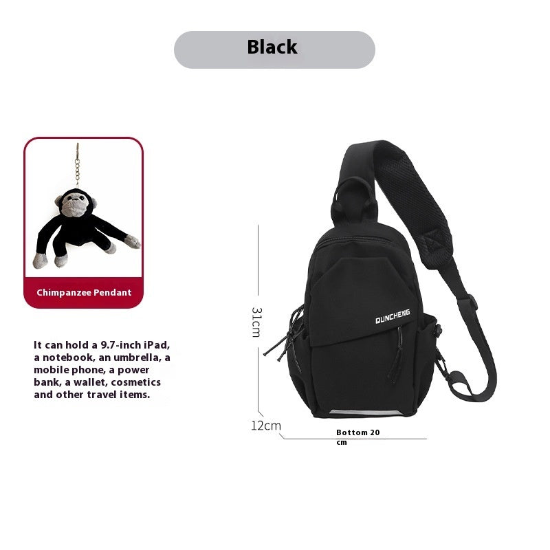 Crossbody bag for men, black with chimpanzee pendant, nylon, street trend style.