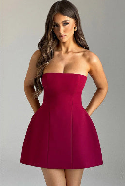 Fashion tube dress in solid red, backless, A-line, short length, styled for summer parties.