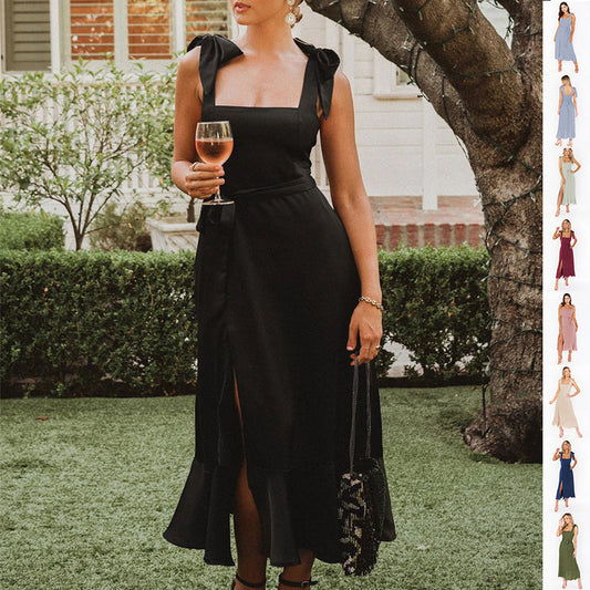 Fashionable black lace-up suspender dress with ruffled hem, perfect for summer beach outings.