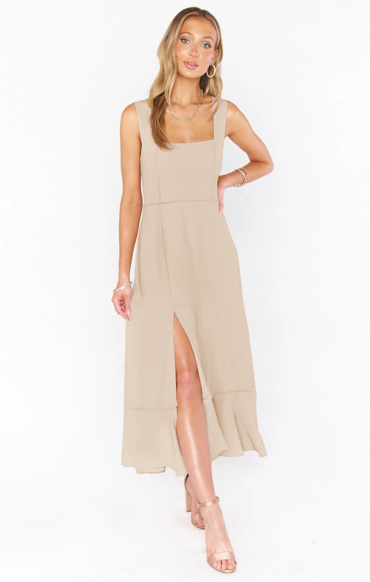 Beige lace-up suspender split dress with ruffled hem.