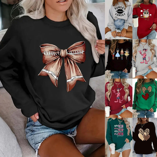 Women's printed long sleeve crew neck sweater with bold designs and medium length.