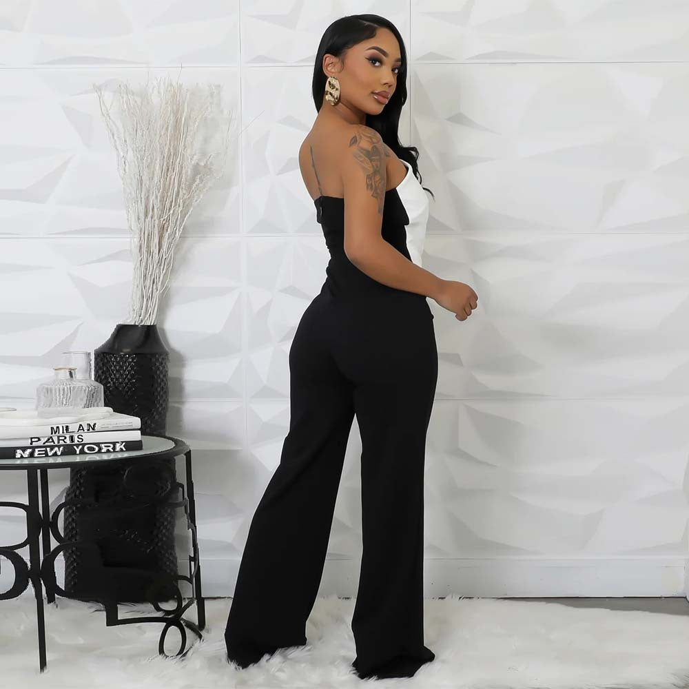 Women's black button jumpsuit with straight pants and mid waist, perfect for commute style.