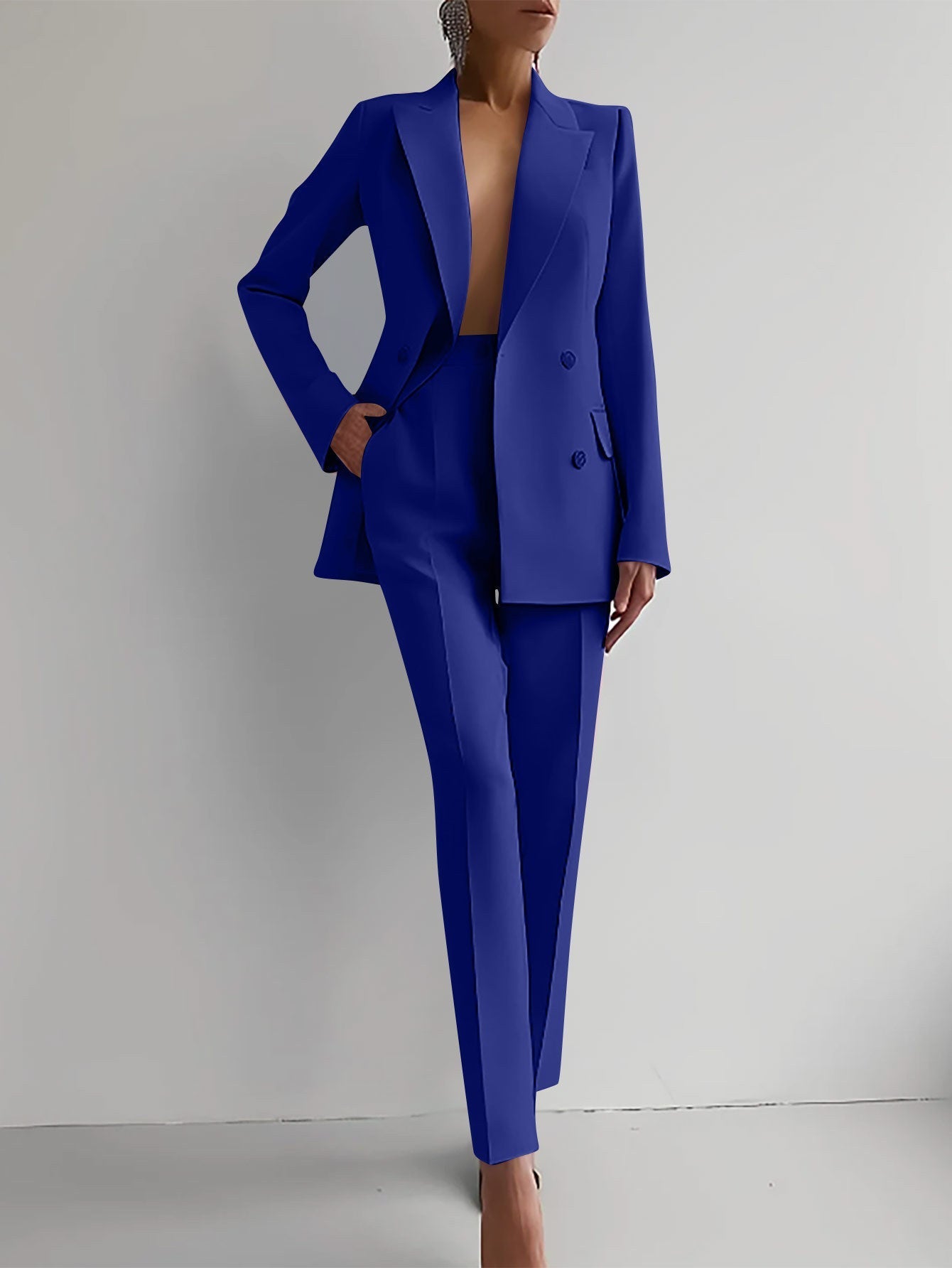 Women's blue casual business suit, long sleeve single-breasted jacket with slim fit trousers.