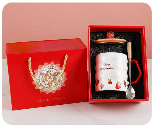 Large capacity ceramic strawberry mug with bamboo lid and spoon, packaged in red gift box.