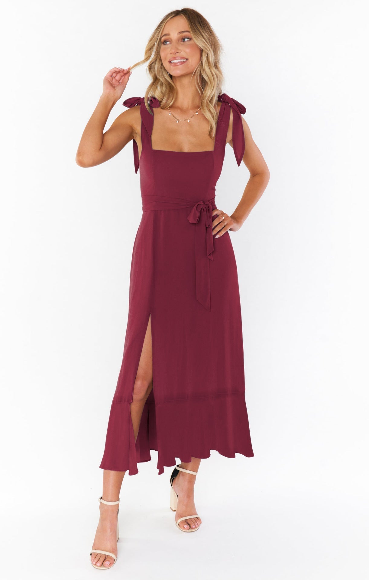 Stylish women’s lace-up dress with suspenders and split design in maroon, perfect for summer beach outings.