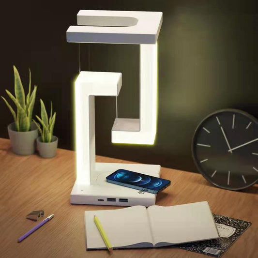 Wireless charging suspension table lamp with magnetic floating design for home or office.