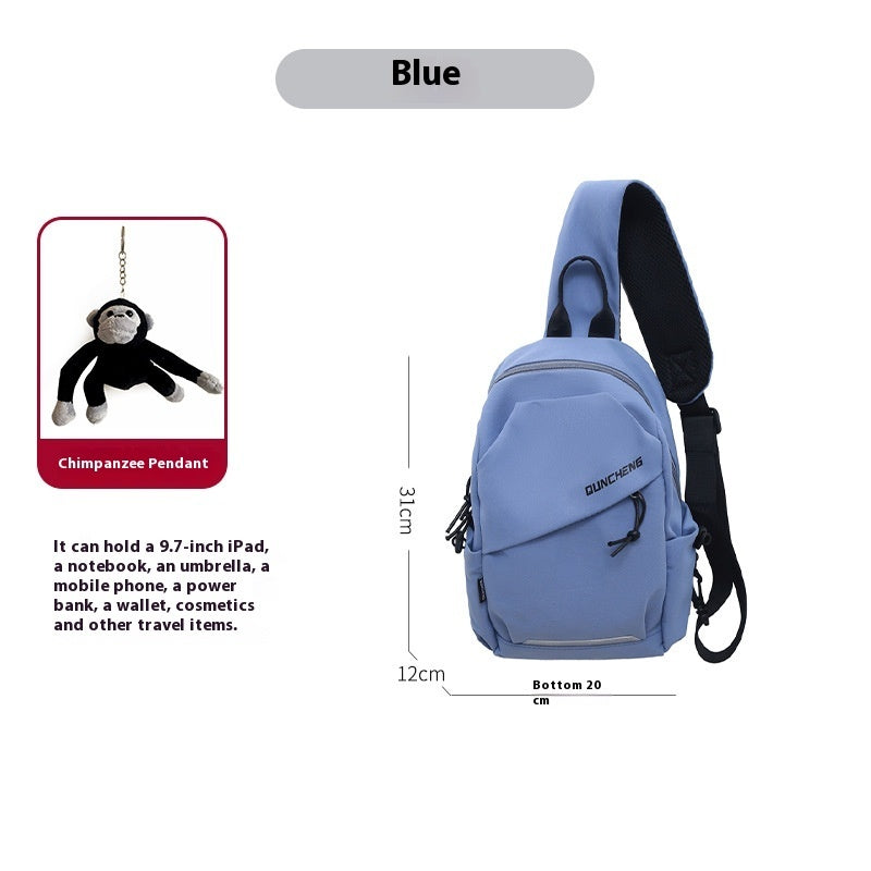 Blue men's crossbody shoulder bag with chimpanzee pendant, ideal for leisure travel, wear-resistant nylon, street trend style.